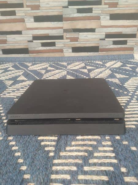 PS4 Slim 1TB with 4 games 1