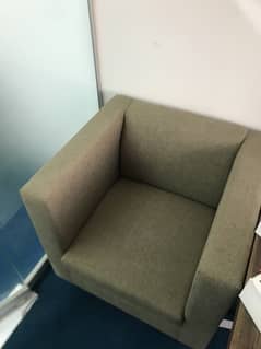 Brown two single seater sofas
