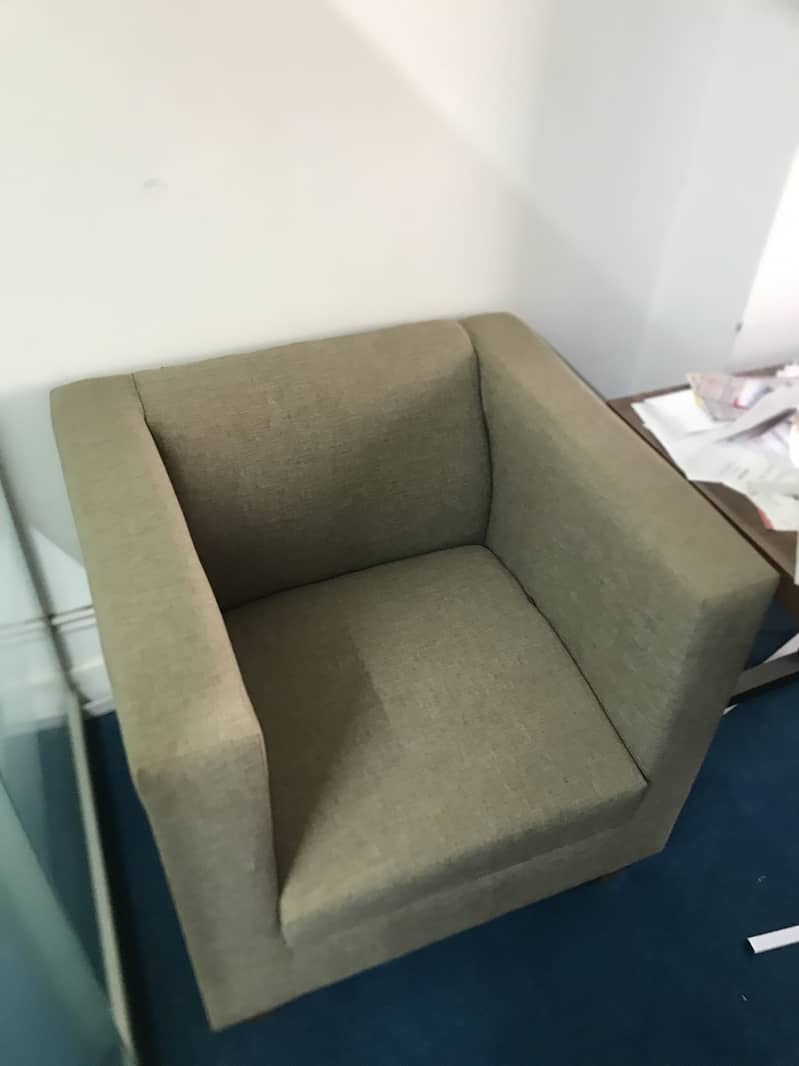 Brown two single seater sofas 1