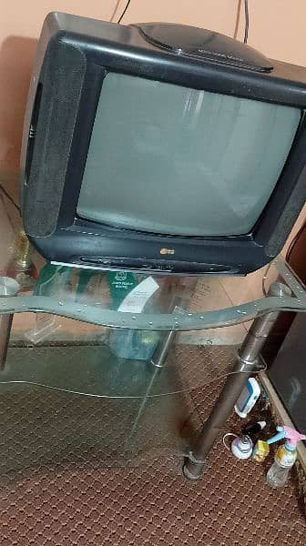 Original LG color tv with (Aero Dome Sounds) with TV trolly 12