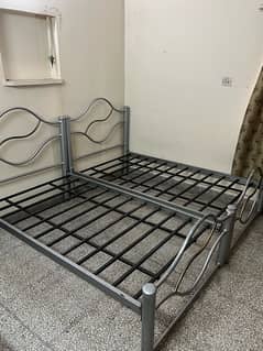 2 iron Single beds ( 1 can also be bought )