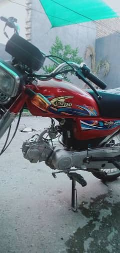 united 70 red new bike all paper are clear nd life time token 0