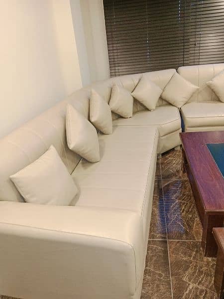 good condition pure Leather 10 setar sofa set 2 table 2