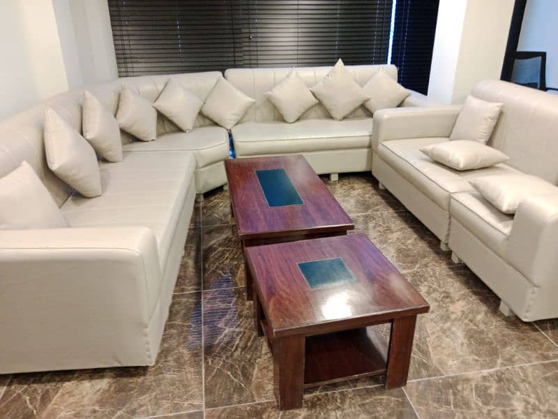 good condition pure Leather 10 setar sofa set 2 table 4