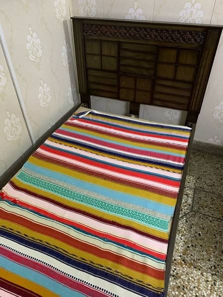 2 single bed 1 year used achi condition ma hai 10 by 8 condition 1