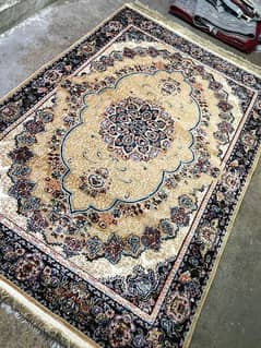 Irani machine made centre rug