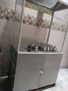 Counter for soda etc with large size cooler and glasses