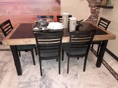 Wooden six chairs dining table
