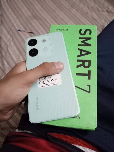 Infinix smart 7 7/64 with box lush condition 0