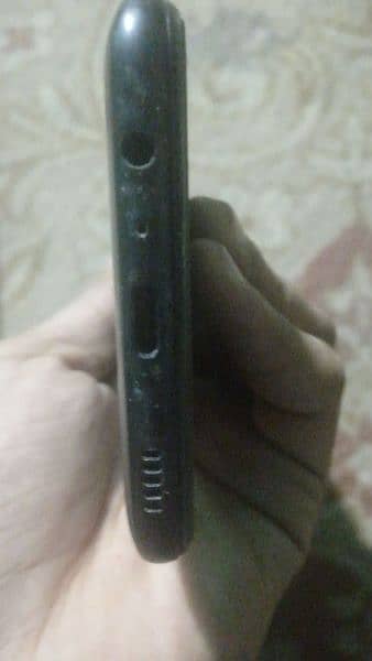 I am selling my Samsung a02s mobile 7