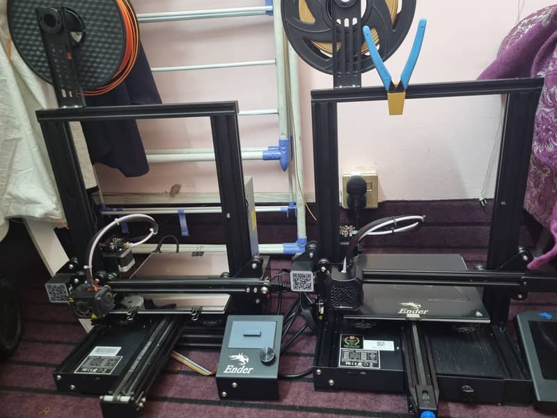 3d printer creality ender 3 pro and ender 3 v2 with boxes 10by10 1