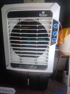 new AC or DC cooler h koi kharabi nhe h abi ak din use Kia h