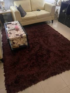 Maroon furry rug