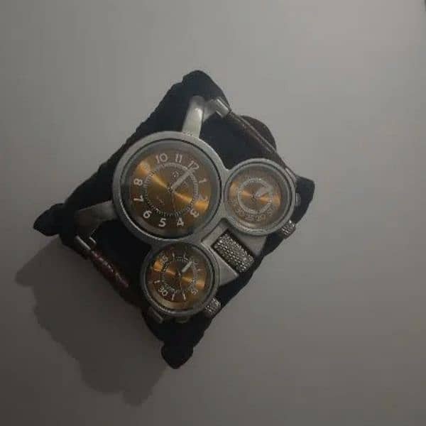 olum tri display watch 1