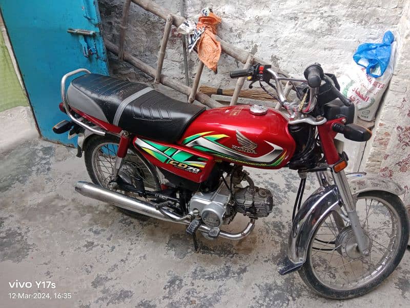 Honda City 70 red colour good bike my contact number 0305 4373041 8