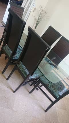 stylish and beautiful shesha table with 6 chairs. condition good