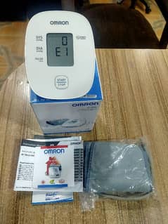 Omron Automatic upper arm blood pressure monitor M1 basic
