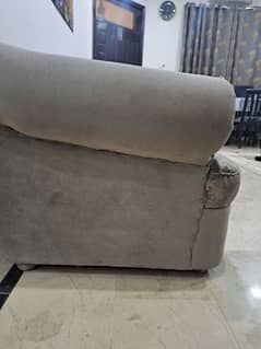 7 seater sofa set grey color with 9 cushions.