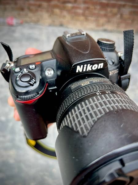 Nikon D7000 DSLR Camera with Lense 18.105mm 6
