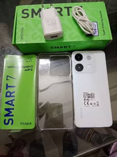 selling my Infinix smart 7 . . . 4/64 pearl white