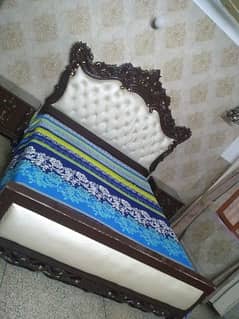 bed with side table 0