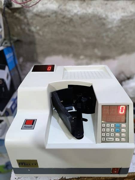 Cash Counting Machine, Packet counter Mix note Counter Pakistan 18