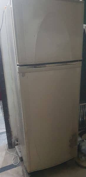 I m selling  my  totally genuine refrigerator 1