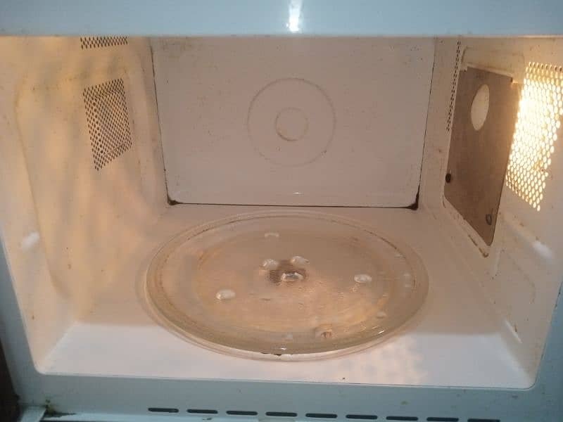 Haier microwave oven.  HR- 5702D. 1