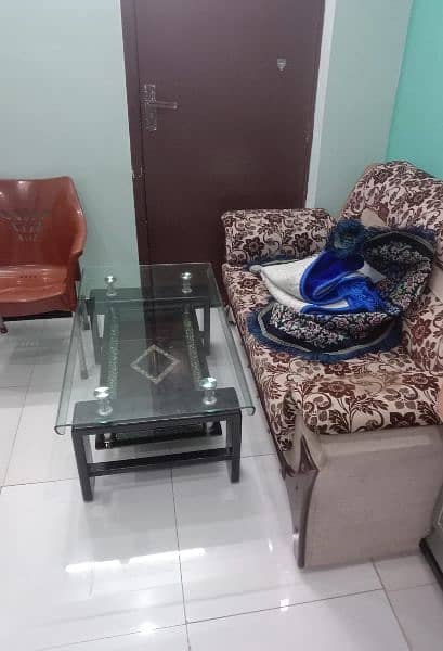 2 seater sofa and glass table 3