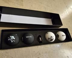 Winner's Volvik Skull Edition Golf Balls 4-pack and hat clip 0