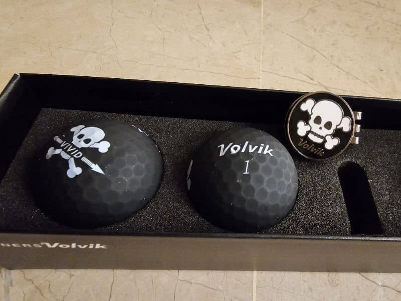 Winner's Volvik Skull Edition Golf Balls 4-pack and hat clip 1