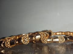 beautiful bangles  looks exactly like gold  bangles  good polished 0