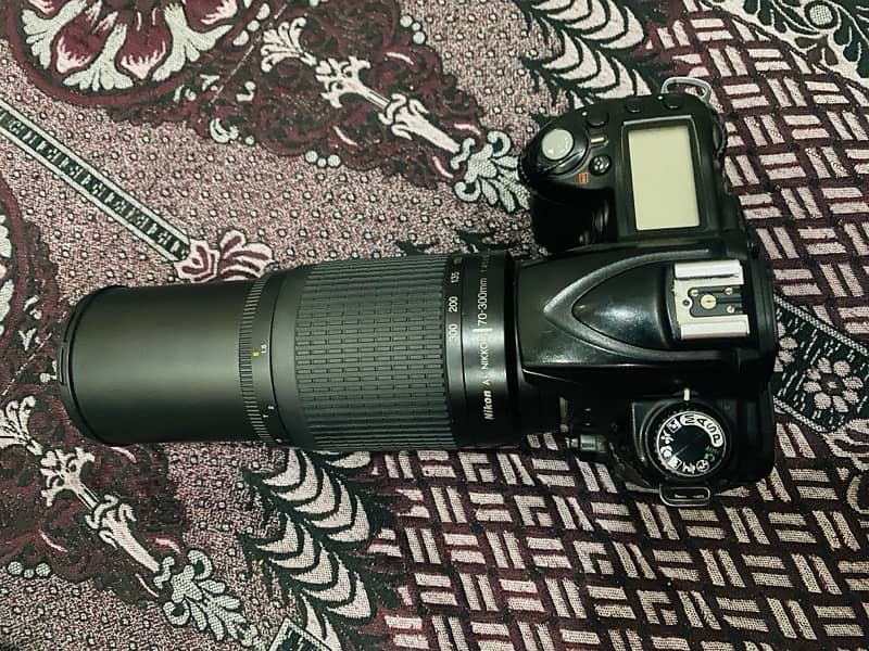 Nikon D90 with 70-300mm lens, Battery, Charger and Bag 1