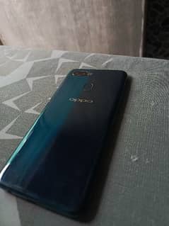 OPPO A7, 3GB/64GB, in used condition with cover and charger.