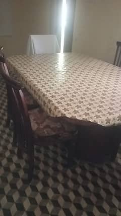 dining table with chairs and dressing table. 0