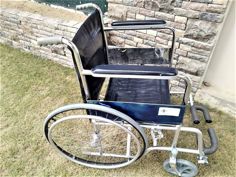 Folding Wheel Chair16000 wali 8700 mein,Read Wheelchair Ad,03022669119 2