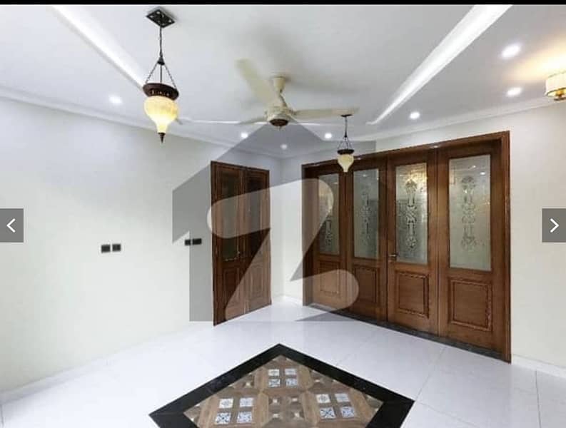 Get an attractive House near to Park in Tariq Garden 6