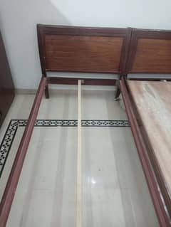 2 single wooden bed with molty foam