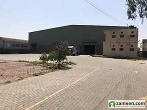 Next to Avicenna Hospital. . . 22 Marla Warehouse Available For Rent in DHA 9 Town | 32kv Transformer Installed | 2 Rooms 2