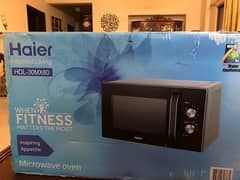 Haier New microwave for sale