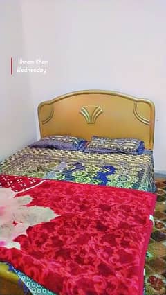 Double bed   with mattress in good condition