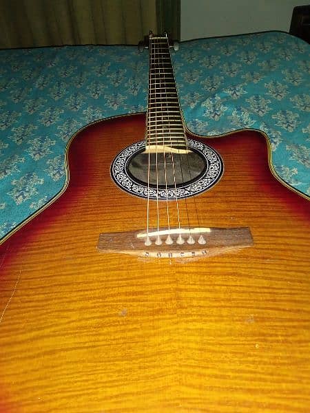 acoustic guitar| old fashioned,classic, curved back guitar 3