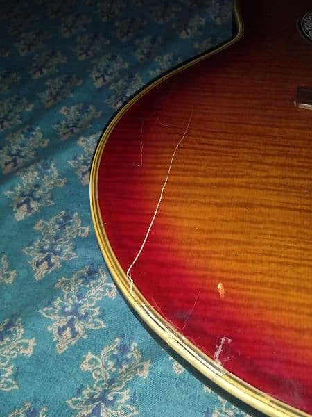 acoustic guitar| old fashioned,classic, curved back guitar 4