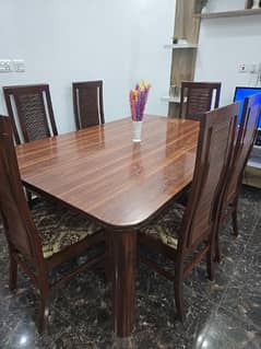Dining table with six chairs made of shisham wood