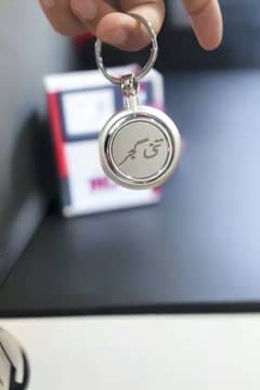 Elegant round keychain with custom name and logo printing
