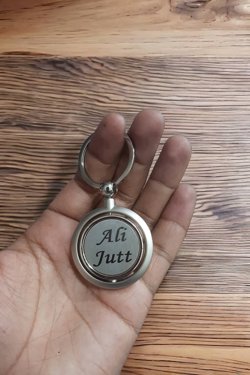 Elegant round keychain with custom name and logo printing 1