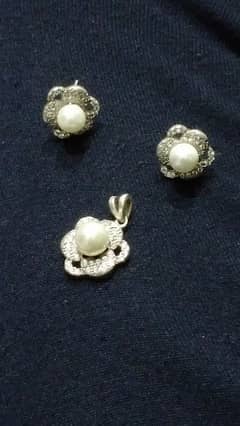 Chandhi 2 Tops and One Locket without chain