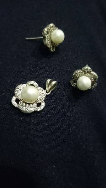 Chandhi 2 Tops and One Locket without chain 1