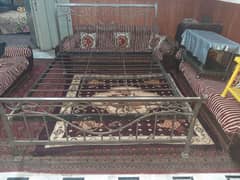 Iron bed 5.5 feet by 6.5 feet for sale