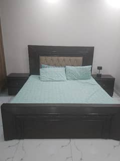 Wooden Bed with side tables